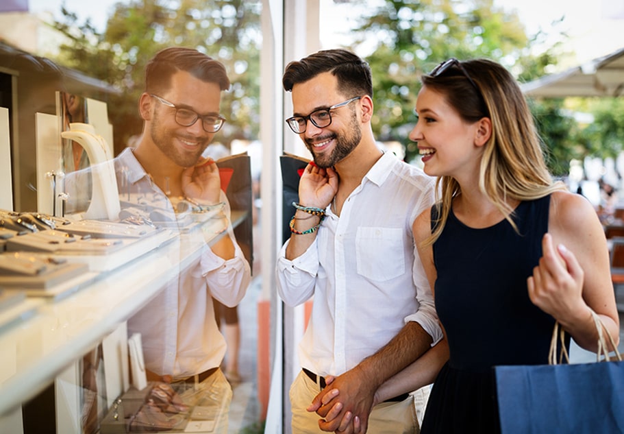 Shopping in Destin Florida couple window shopping in destin florida